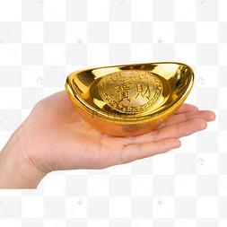 梦见拿着金元宝