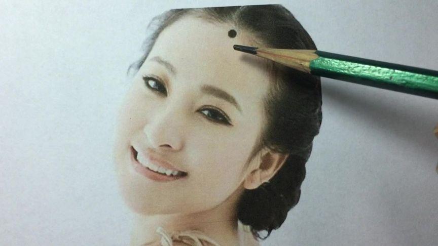 天中有痣的女人