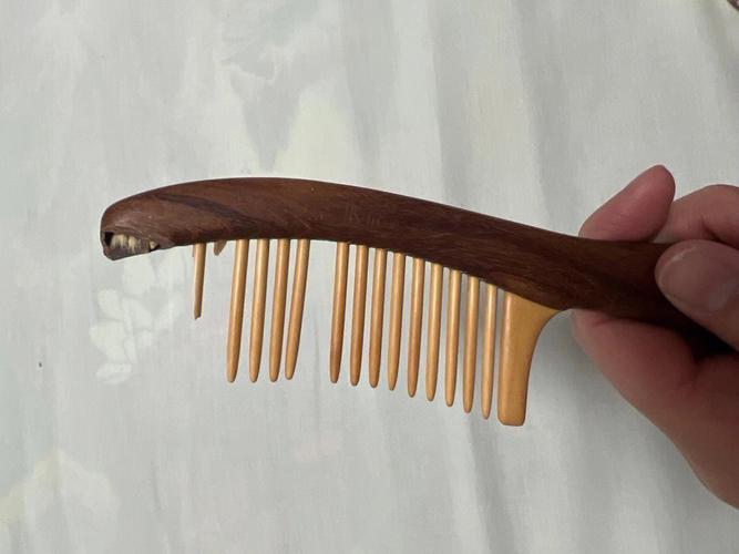 梦见断齿的梳子什么意思