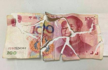 梦见自己把钱撕碎